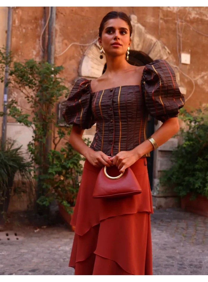 Brown top with a striped print and puffed sleeves