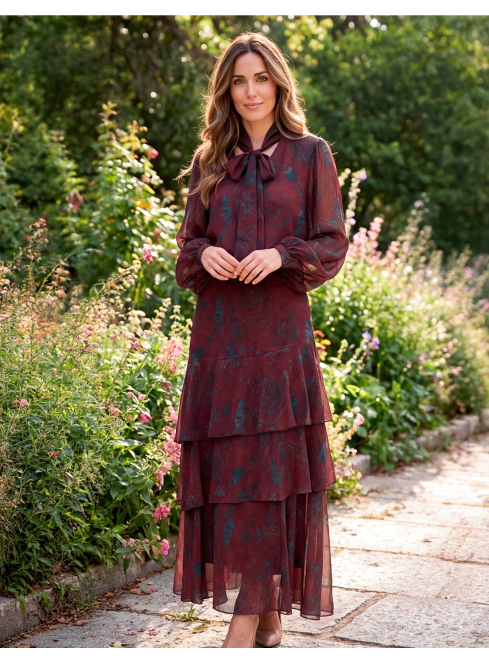 Maroon outfit with a ruffled skirt and a blouse with a bow