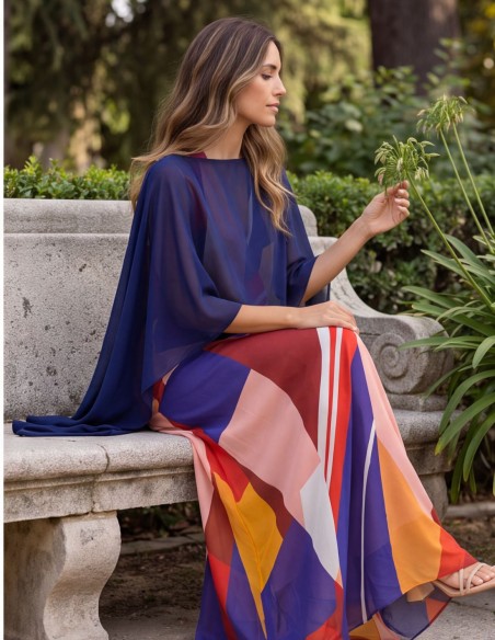 A light, airy gauze cape with a flowing drape in navy blue