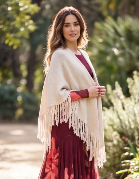 Poncho blanco multiposición con flecos