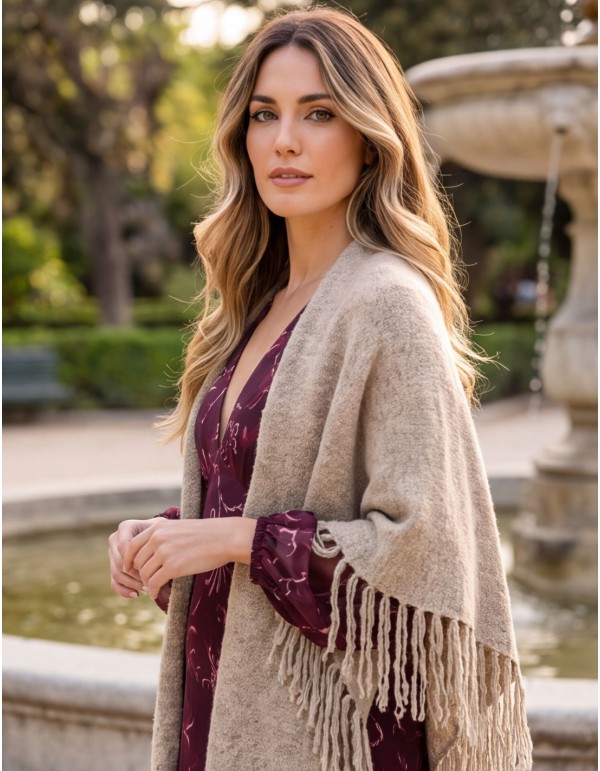 Beige multi-position poncho with fringe