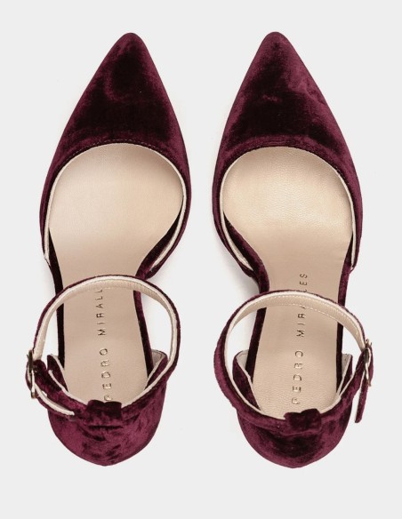 Maroon velvet high heels with a pointed toe