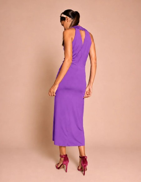Purple silky knit midi dress with a draped halter neckline