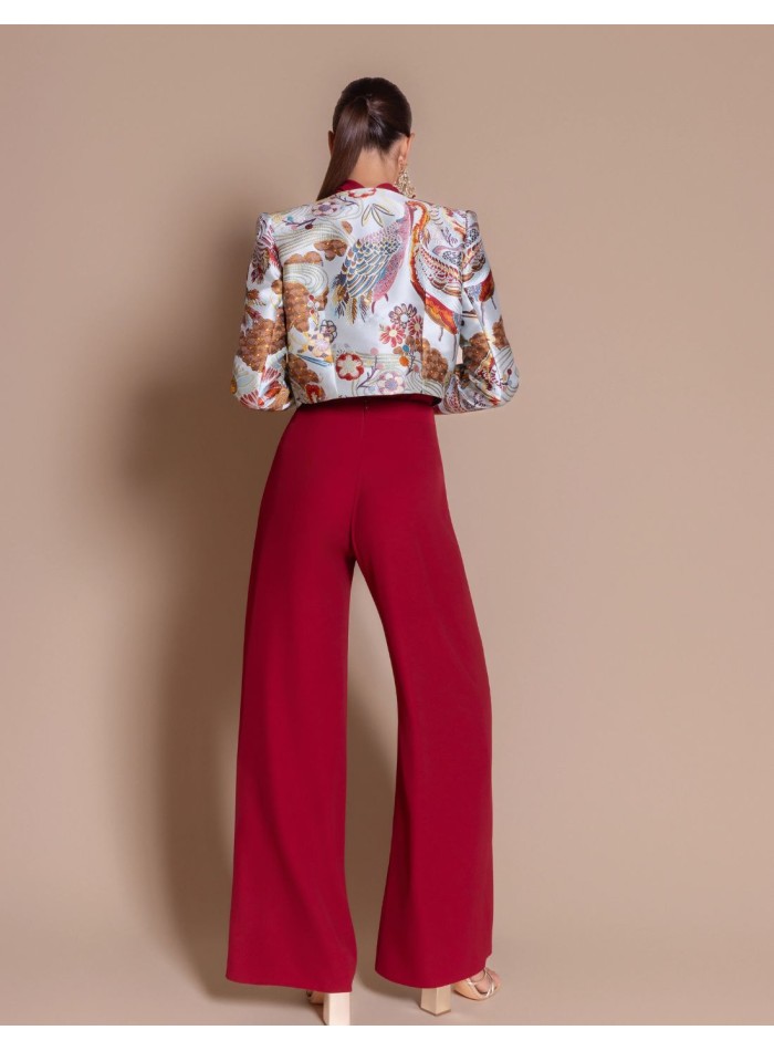 Sky-blue torera with an exotic bird print