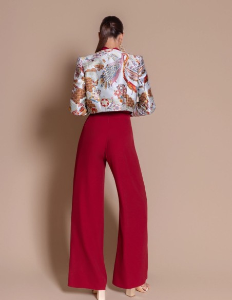 Sky-blue torera with an exotic bird print