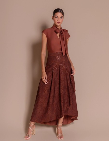 Brown blouse with a bow at the neck