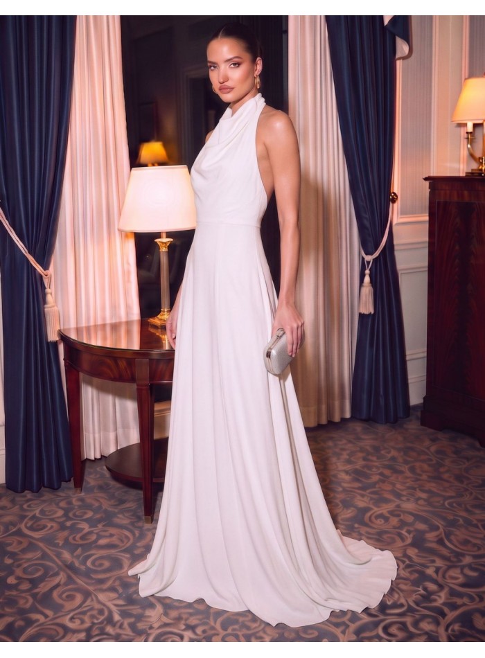 Long dress with a halter neckline and an open back