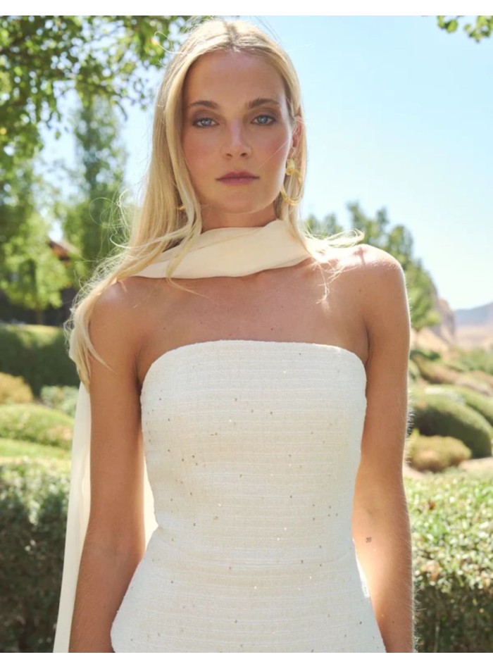 Off-white strapless bridal top with an...