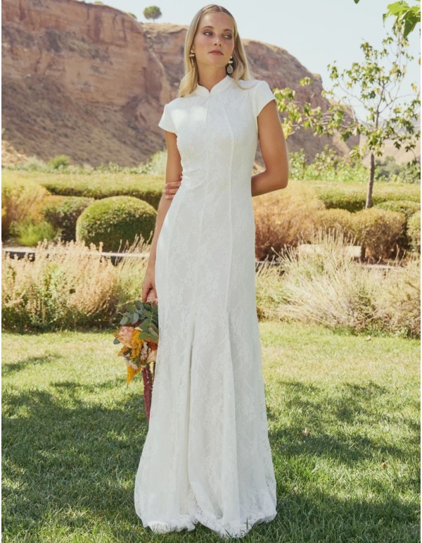 Long white lace wedding dress with a mandarin collar