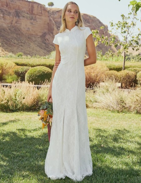 Long white lace wedding dress with a mandarin collar