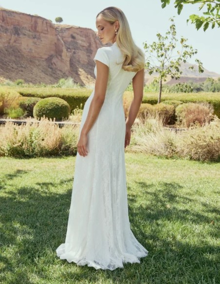 Long white lace wedding dress with a mandarin collar