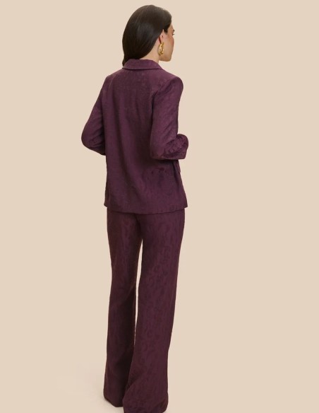 Aubergine-colored jacquard suit pants with a flared silhouette