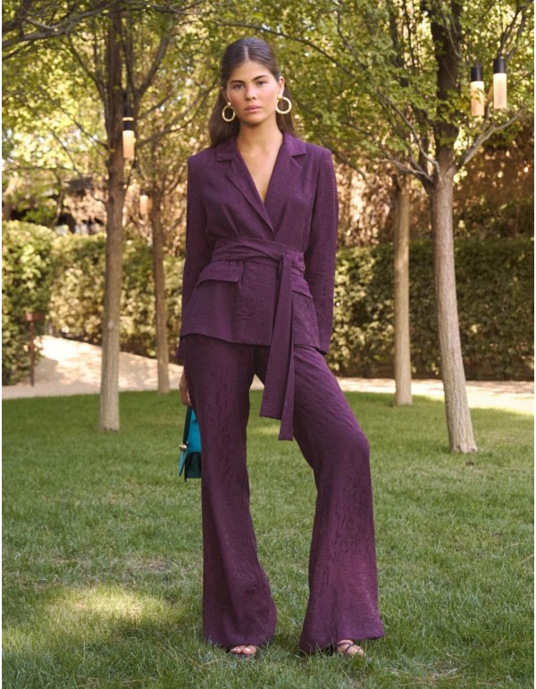 Aubergine-colored jacquard suit pants with a flared...