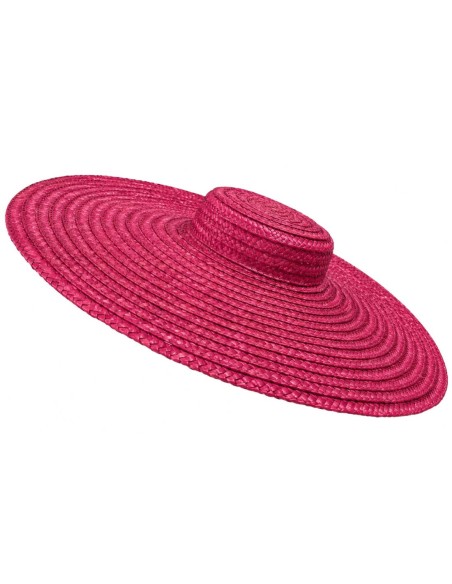 Raffia headpiece with an asymmetrical brim and a braided crown