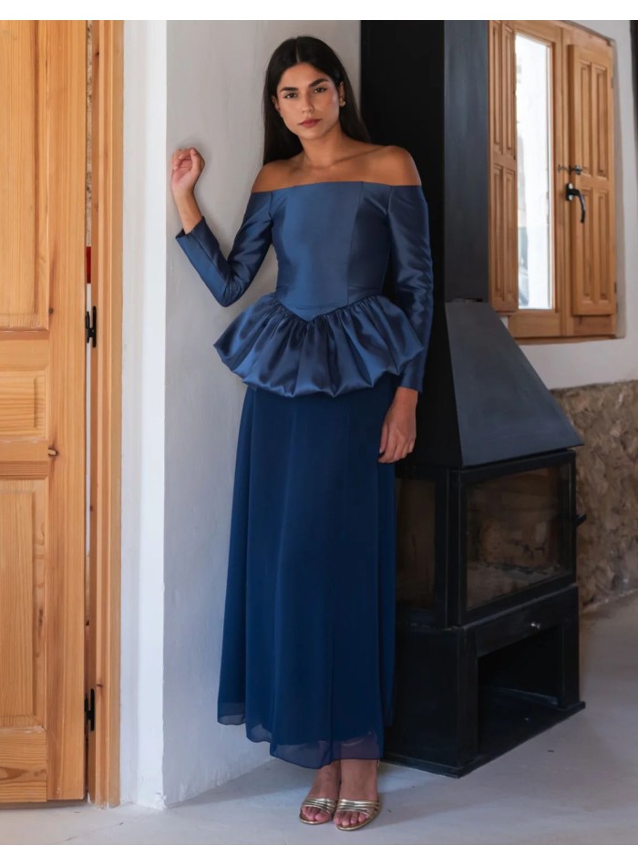 Blue outfit consisting of a chiffon skirt and a...