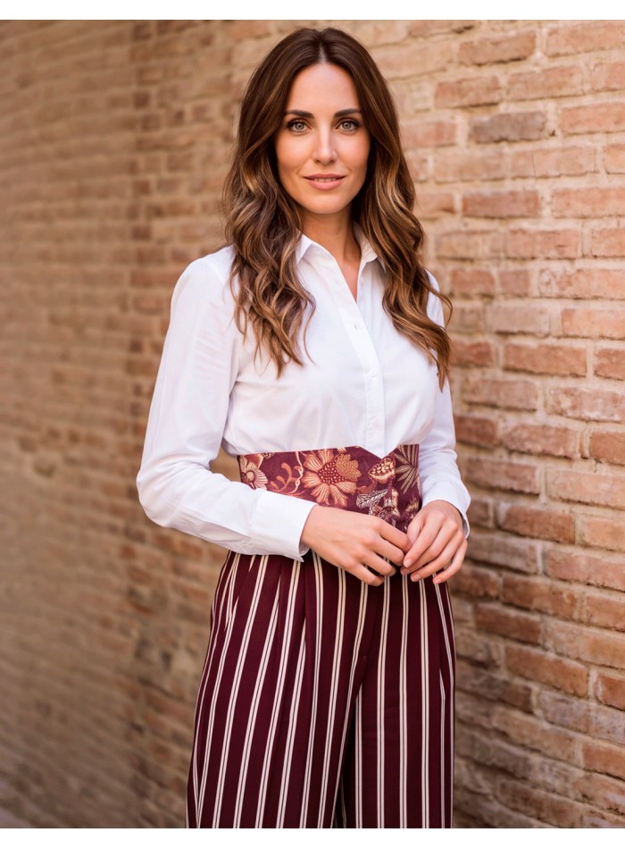 This reversible maroon sash offers two different ways to wear the same piece.