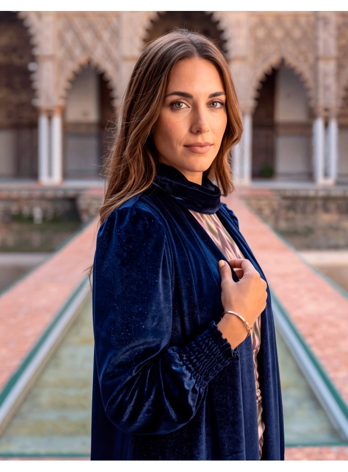 An elegant, long navy blue velvet kimono with a built-in shawl,