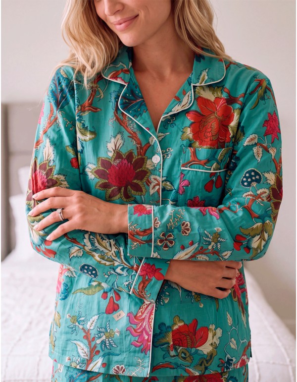 Turquoise blue cotton pajamas with a floral print for women