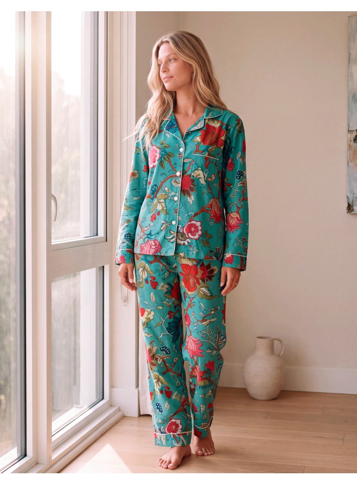 Women's cotton pajamas with a floral print on a turquoise background