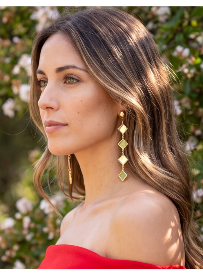 Boucles d'oreilles longues dorées avec des miroirs