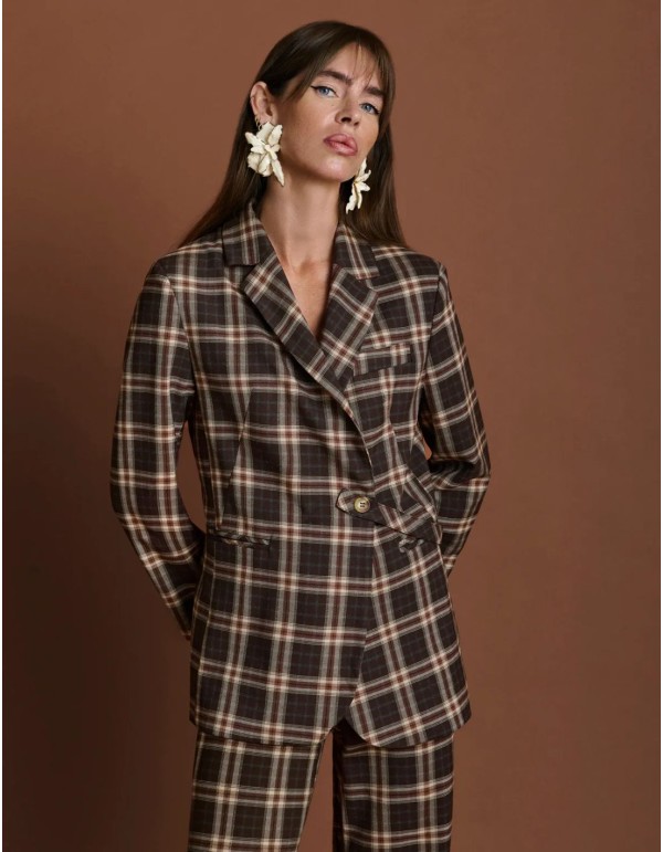 Veste cintrée à la silhouette marquée et à motif à carreaux