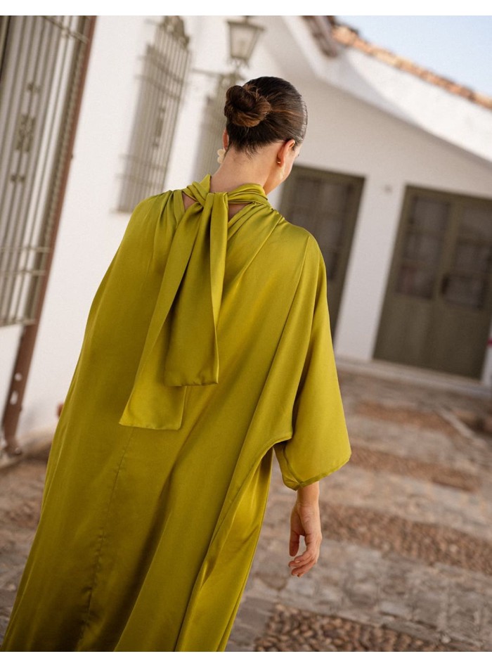 Long dress made of flowing satin fabric with a...