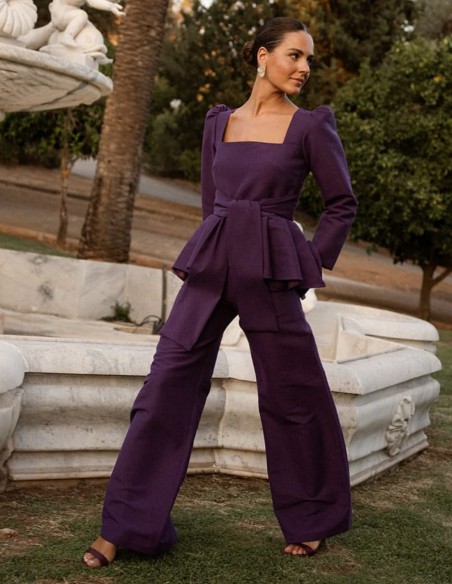 Purple peplum top with a square neckline and a tie detail