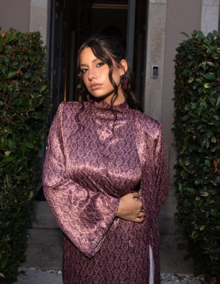 Long, flowing kimono in blackberry tones with a print