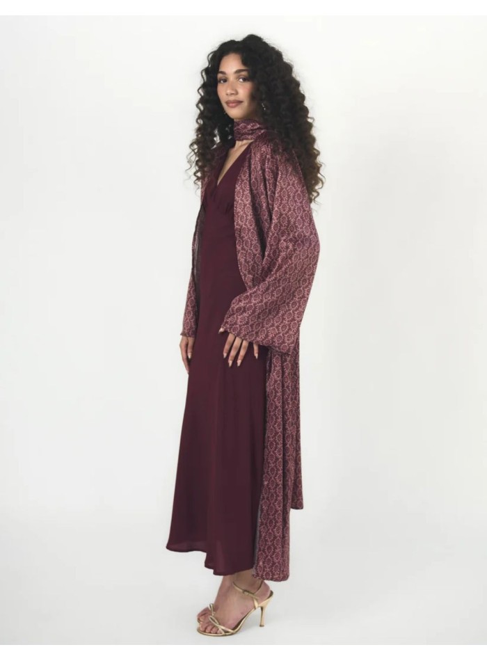 Long, flowing kimono in blackberry tones with a...