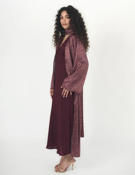Long, flowing kimono in blackberry tones with a print