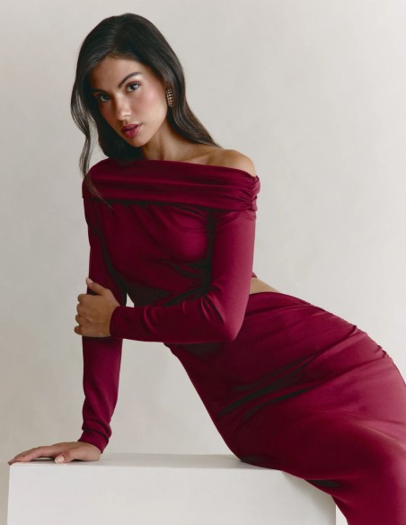 Asymmetrical midi dress with long sleeves and a cutout at the waist