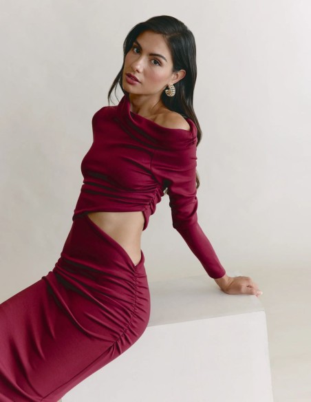 Asymmetrical midi dress with long sleeves and a cutout at the waist
