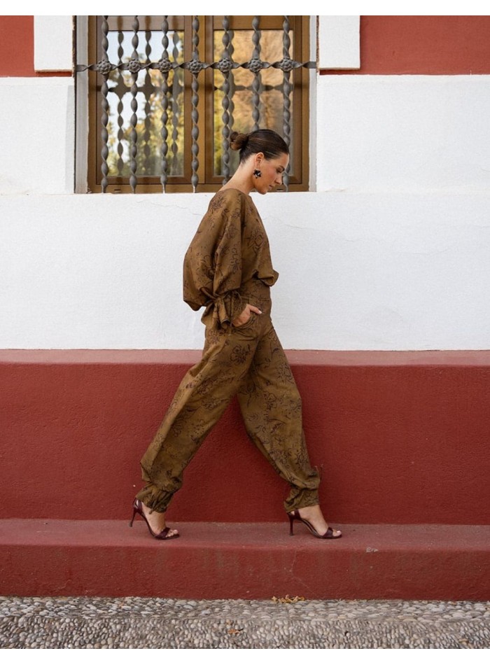 Pantalon long bouffant vert à motifs