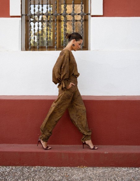 Pantalon long bouffant vert à motifs