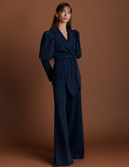 Navy blue pinstripe pants with a flared cut