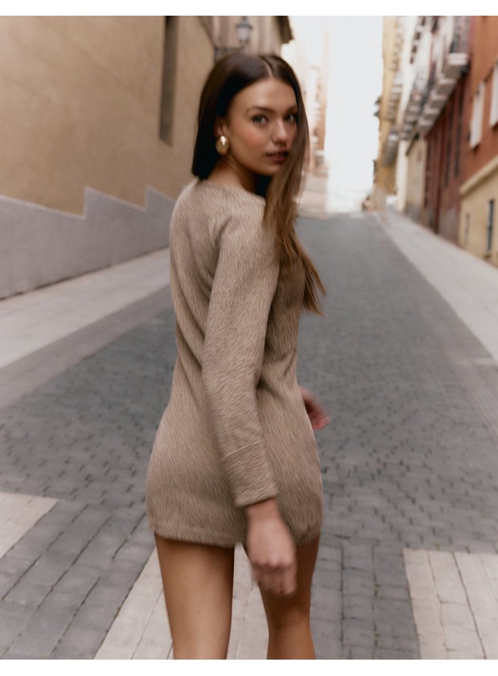 Short knit dress with long sleeves and a...