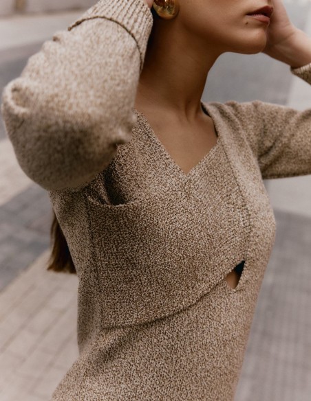 Short knit dress with long sleeves and a crossover neckline