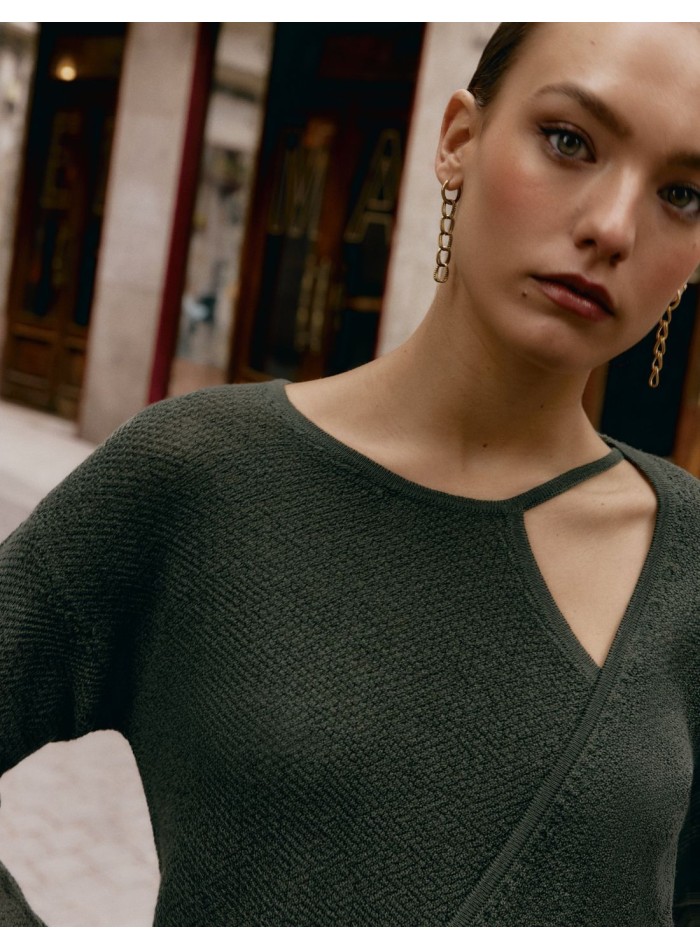 Ribbed sweater with an asymmetrical cutout