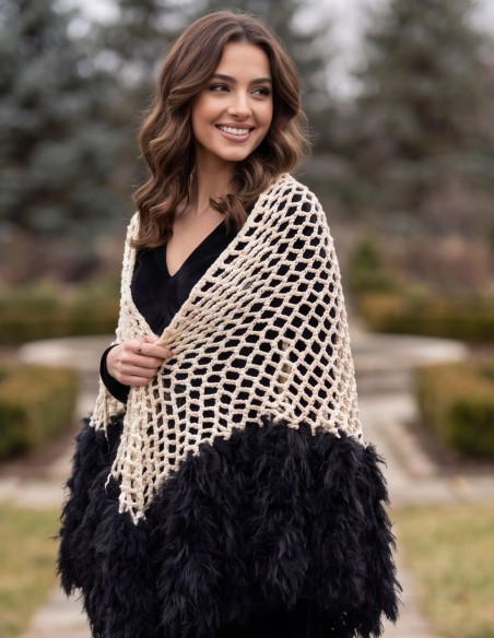 Beige knitted shawl with a black faux-fur trim for a guest