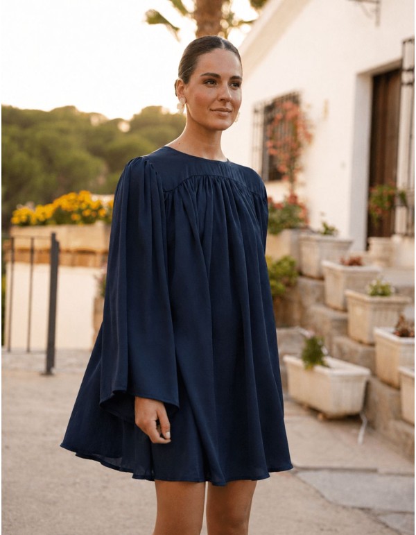 Navy blue mini dress with pleats and pronounced shoulder pads
