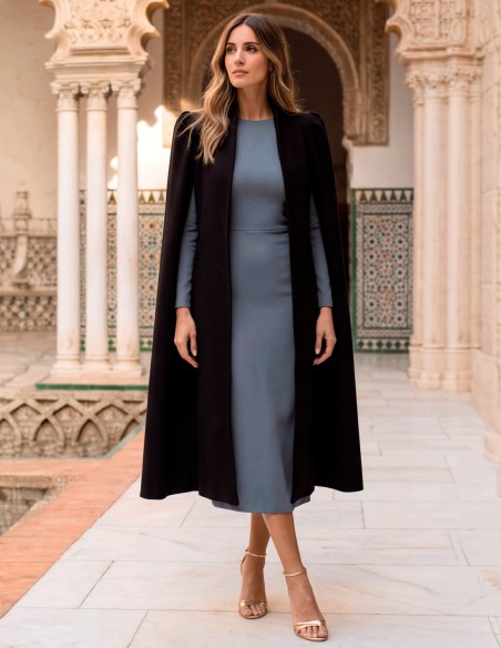 An elegant black wool coat with puffed sleeves