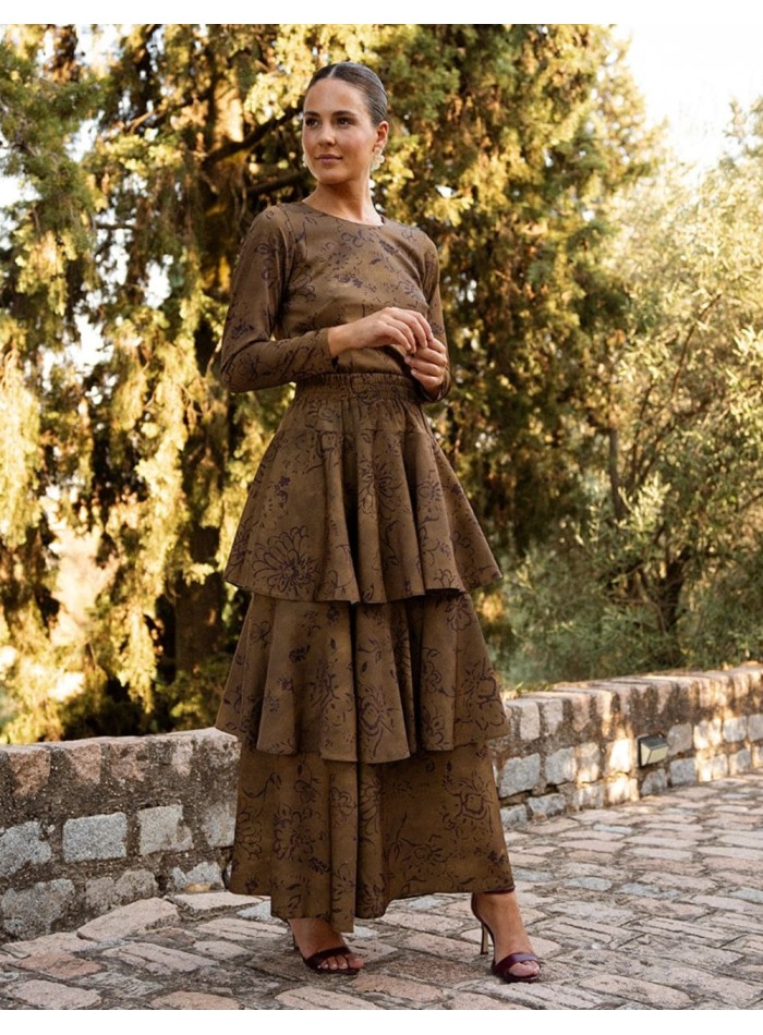 Green skirt with a brown print and cascading ruffles