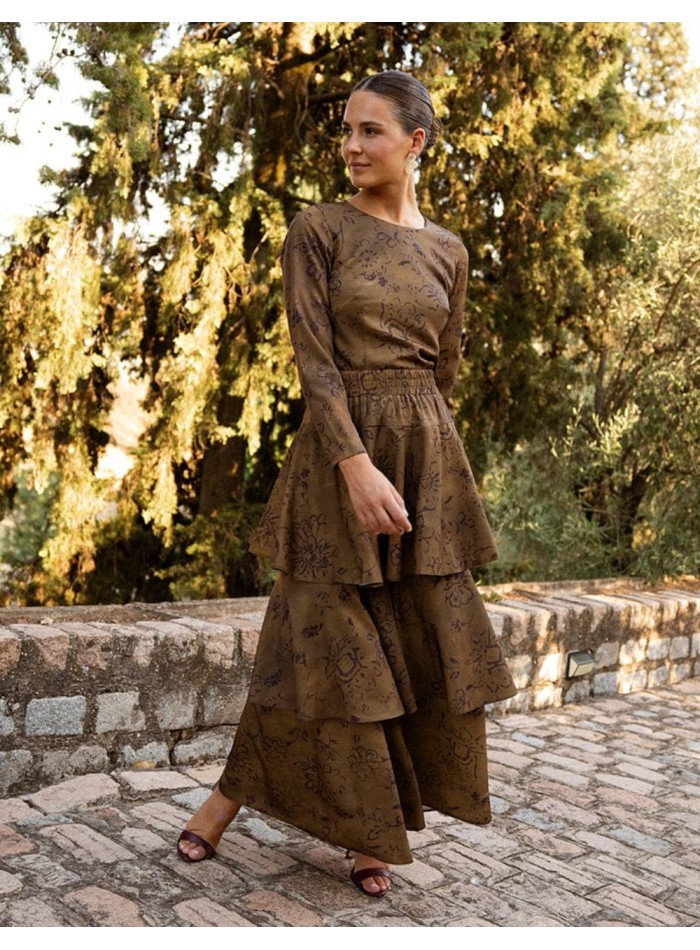 Green skirt with a brown print and cascading ruffles