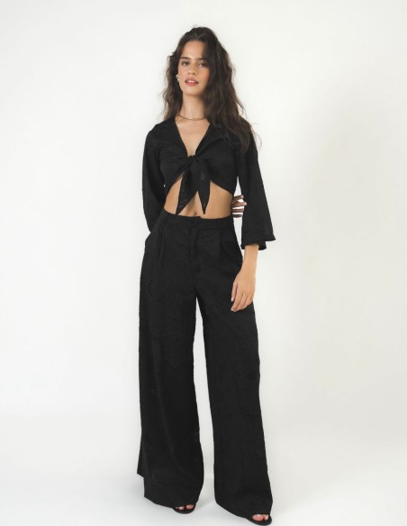 Pantalones palazzo de talle alto con brocado semitransparente