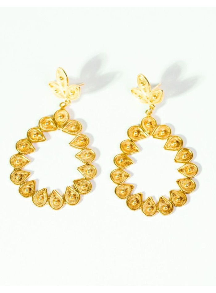 Openwork earrings with a teardrop design and...