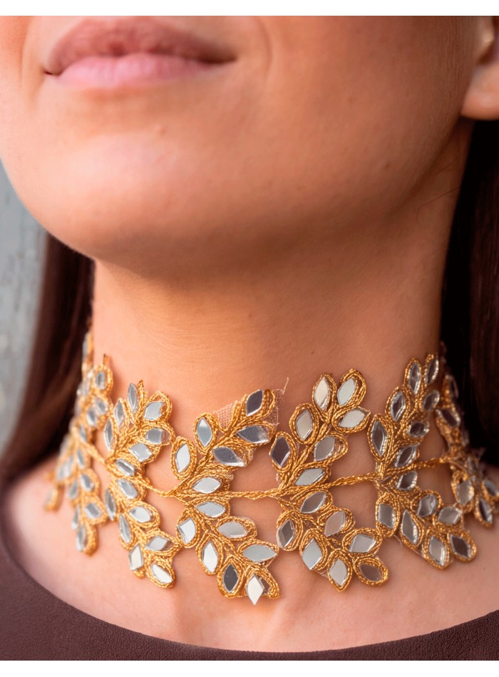 handcrafted gold choker stands out for its botanical-inspired design