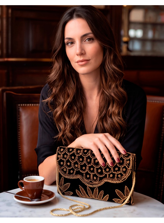Black velvet party clutch with hand-sewn gold beads
