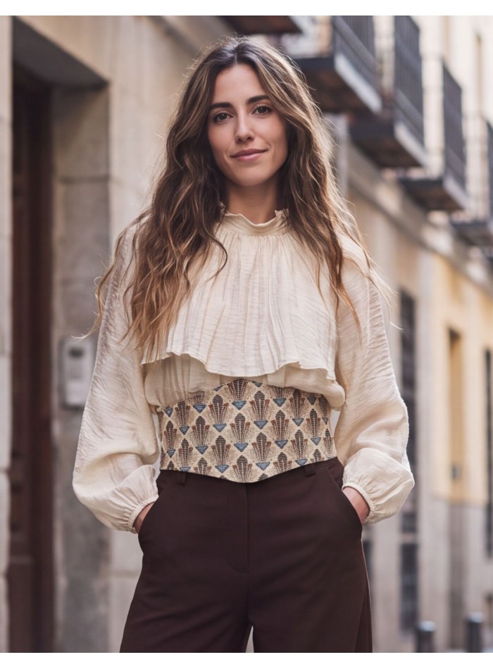 Wide beige sash with a geometric pattern in...