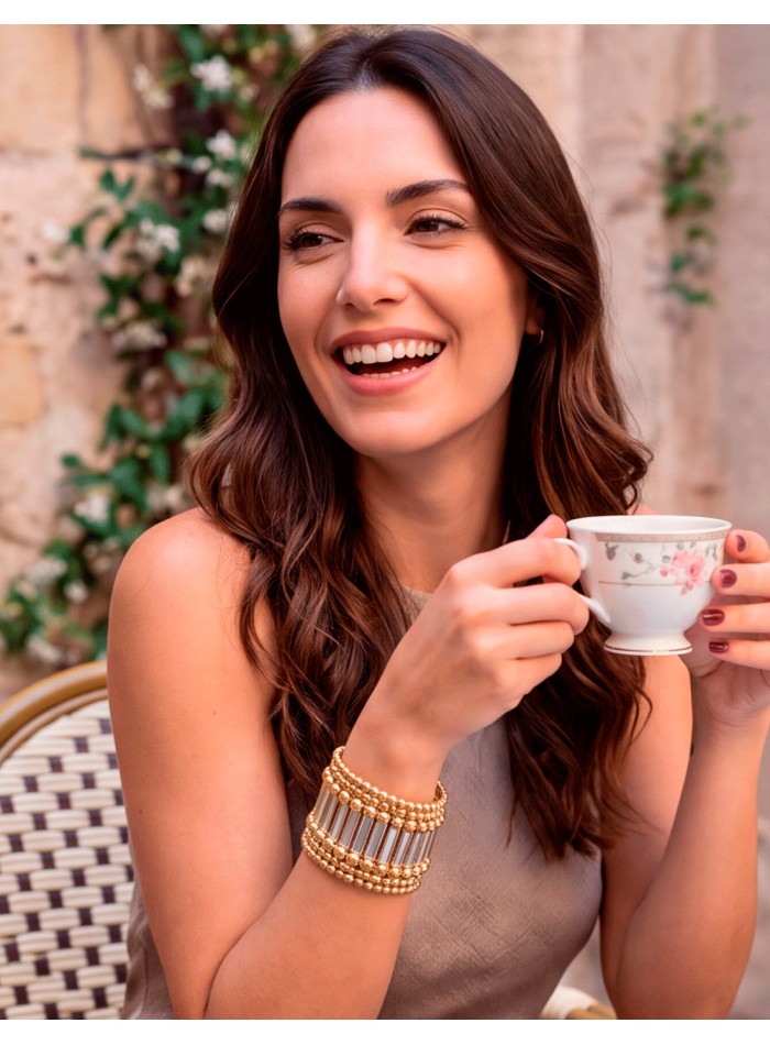 A wide gold-tone brass bracelet