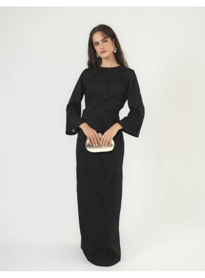 Long black brocade dress with an open back, draped U-shaped neckline and butterfly sleeves.